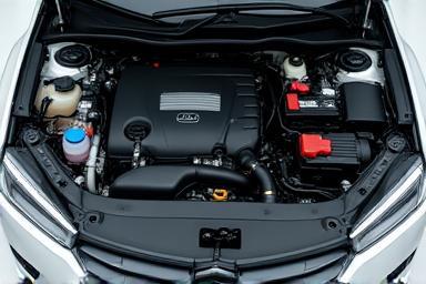 A meticulously cleaned and detailed engine bay of a modern car.